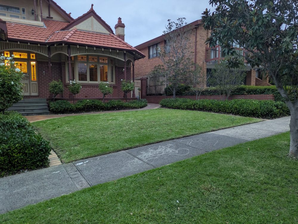 Freshly mown front lawn at a Melbourne period home